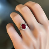 Vintage Sterling Silver Ring with Oval Red Stone and White CZ Halo