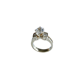 14K Gold Three-Stone Engagement Ring with Round and Princess Cut Stones