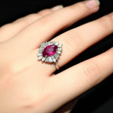 Sterling Silver Pear-Cut Red Stone and Clear Stone Halo Cocktail Ring